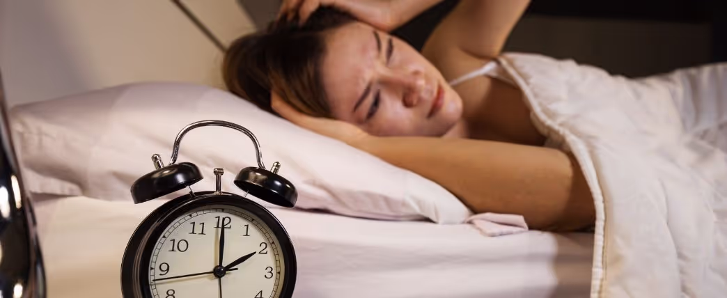 Woman having a hard time getting to sleep: how long can you go without sleep