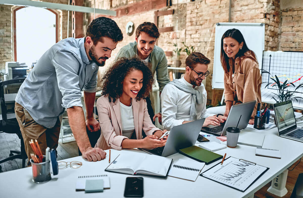 Happy team working together